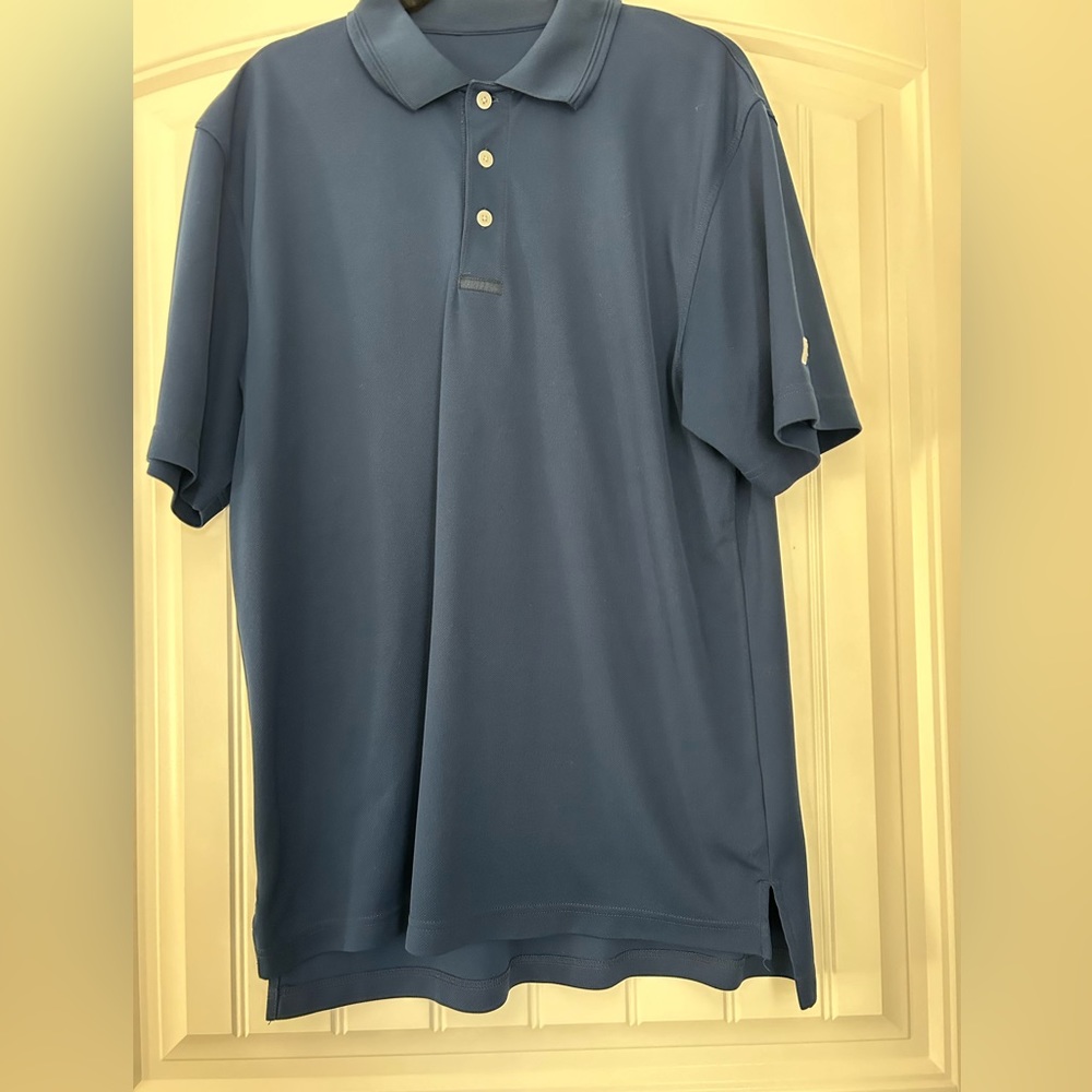Russell navy blue polo, size large. 100% polyester. Great used condition.